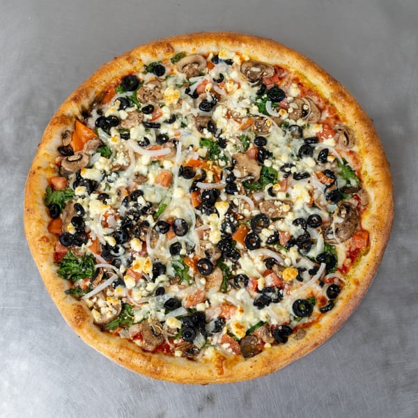 Mama Ginna's Italian pizza with mushrooms, black olives, onions, spinach, tomatoes, and feta cheese.
